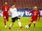 Germany's Nico Schulz in action with Turkey's Efecan Karaca in an international friendly on October 7, 2020