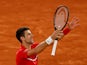 Novak Djokovic celebrates after beating Stefanos Tsitsipas to reach the French Open final on October 9, 2020