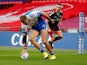 Leeds Rhinos' Ash Handley scores a try against Salford Red Devils in the Challenge Cup Final on October 17, 2020