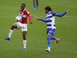 Middlesbrough's Marc Bola in action with Reading's Michael Olise in the Championship on October 17, 2020