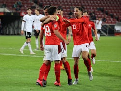 Switzerland's Mario Gavranovic celebrates scoring against Germany with teammates in the UEFA Nations League on October 13, 2020