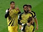 Watford's Joao Pedro celebrates with teammates after scoring against Derby County on October 16, 2020