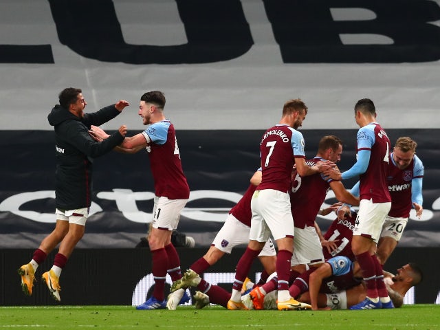 West Ham United celebrate Manuel Lanzini's equalizer against Tottenham Hotspur in the Premier League on October 18, 2020