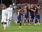 Barcelona's Lionel Messi celebrates with teammates after scoring against Ferencvaros on October 20, 2020
