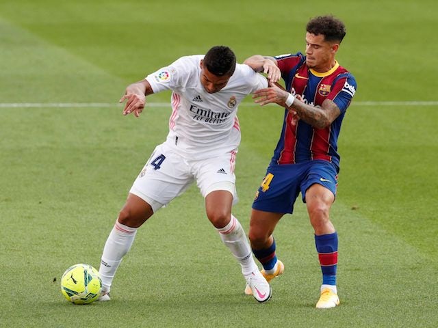 Real Madrid's Casemiro in action with Barcelona's Philippe Coutinho in La Liga on October 24, 2020
