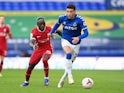 Ben Godfrey in action for Everton with Liverpool's Sadio Mane on October 17, 2020