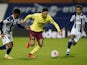 Burnley's Dwight McNeil carries the ball against West Bromwich Albion on October 19, 2020