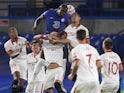 Chelsea's Kurt Zouma competes with Sevilla players during their Champions League match on October 20, 2020