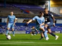Swansea City's Andre Ayew scores against Coventry City on October 20, 2020
