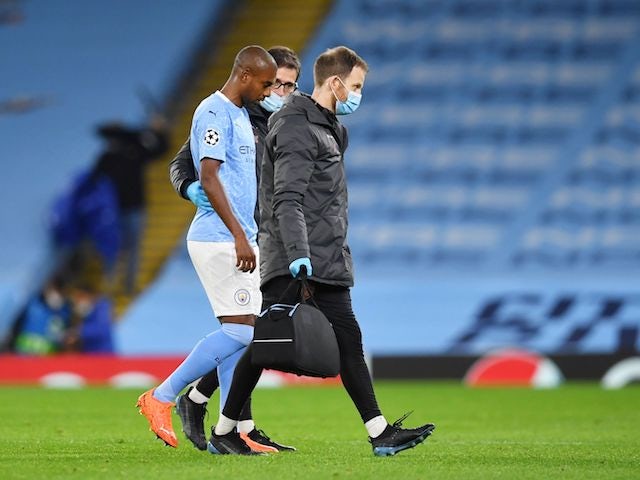 Manchester City midfielder Fernandinho walks off the pitch after picking up an injury against Porto on October 21, 2020