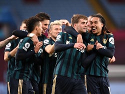 Patrick Bamford celebrates with teammates after scoring for Leeds United against Aston Villa in the Premier League on October 23, 2020