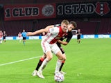 Ajax's Perr Schuurs in action against Liverpool in October 2020