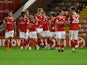 Barnsley's Conor Chaplin celebrates with teammates after scoring against QPR in the Championship on October 27, 2020