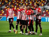 Brentford's Ivan Toney celebrates with teammates after scoring against Norwich City in the Championship on October 27, 2020