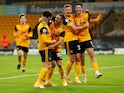 Daniel Podence celebrates scoring for Wolverhampton Wanderers against Crystal Palace with teammates in the Premier League on October 30, 2020