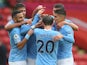 Kyle Walker celebrates with teammates after scoring for Manchester City against Sheffield United in the Premier League on October 31, 2020