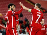 Liverpool's Mohamed Salah celebrates scoring against FC Midtjylland in the Champions League with James Milner on October 27, 2020