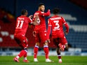 Reading's Josh Laurent celebrates with teammates after scoring against Blackburn Rovers in the Championship on October 27, 2020