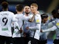 Swansea City's Jay Fulton celebrates with teammates after scoring againt Stoke City in the Championship on October 27, 2020