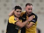 AEK Athens players celebrate scoring against Leicester City in. the Europa League in October 2020