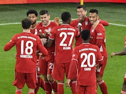 Bayern Munich players celebrate after Robert Lewandowski scores against Borussia Dortmund on November 7, 2020