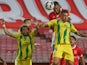 Tondela players challenge for the all against Benfica in June 2020
