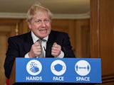 Boris Johnson appears at a press conference on October 31, 2020 to announce a second lockdown in England