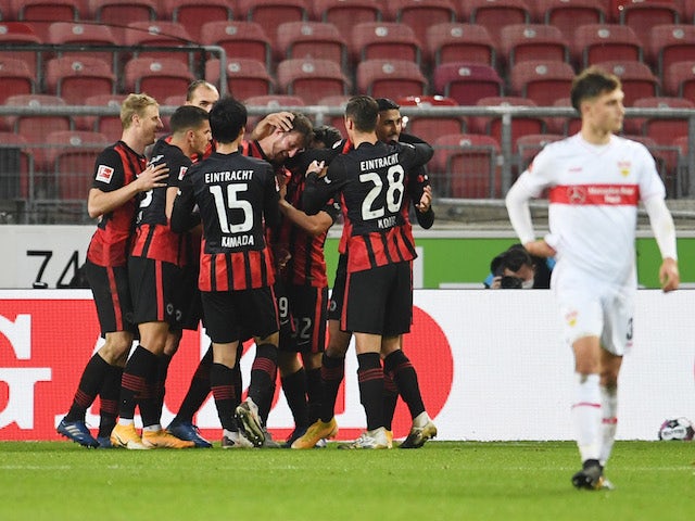 Eintracht Frankfurt's David Abraham celebrates with teammates after scoring against Stuttgart on November 7, 2020
