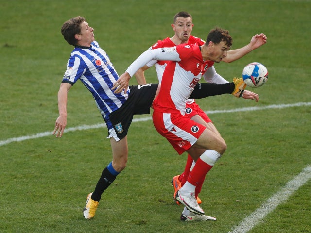 Sheffield Wednesday's Adam Reach in action with Millwall's Jake Cooper in the Championship on November 7, 2020