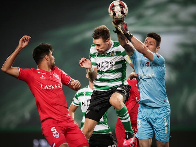 Gil Vicente players Rodrigao and Denis challenge for the ball in July 2020