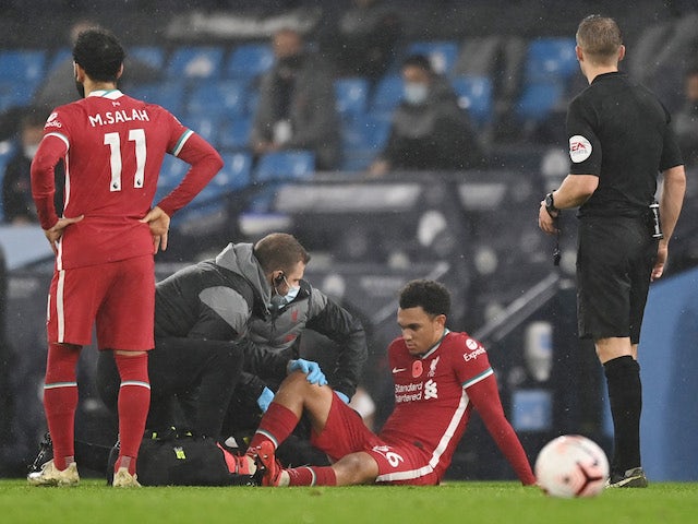 Liverpool defender Trent Alexander-Arnold receives treatment for an injury on November 8, 2020