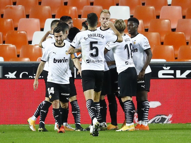 Valencia players celebrate Carlos Soler's goal against Real Madrid on November 8, 2020
