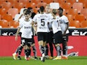 Valencia players celebrate Carlos Soler's goal against Real Madrid on November 8, 2020