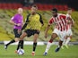 Watford's Joao Pedro in action with Stoke City's John Obi Mikel in the Championship on November 4, 2020