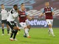 West Ham United players celebrate after Fulham's Ademola Lookman misses a penalty in their Premier League clash on November 7, 2020