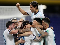 Argentina players celebrate scoring against Paraguay on November 13, 2020