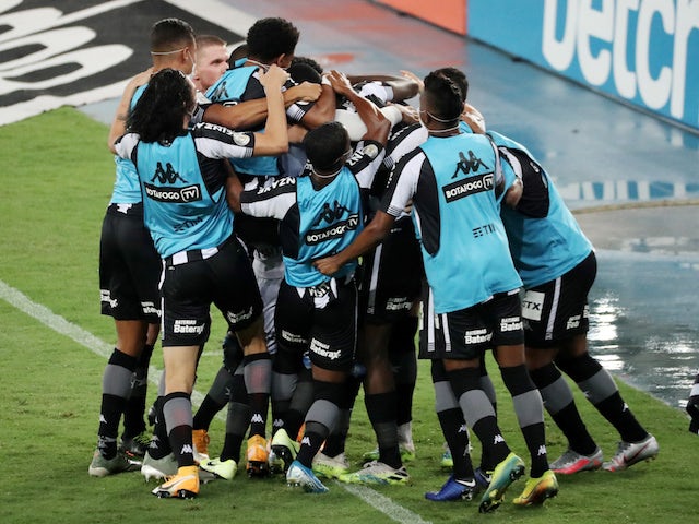 Botafogo players celebrate a goal in October 2020