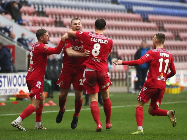 Chorley players celebrate after Connor Hall scores against Wigan Athletic in the FA Cup on November 8, 2020