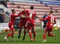 Chorley players celebrate after Connor Hall scores against Wigan Athletic in the FA Cup on November 8, 2020
