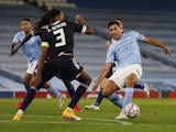 Manchester City's Rodri in action with Olympiacos' Ruben Semedo in the Champions League on November 3, 2020