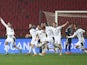 Serbia players celebrate scoring against Scotland on November 13, 2020