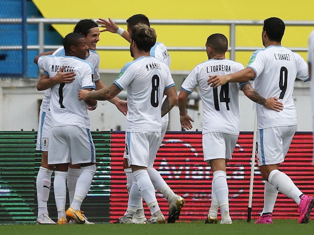 Uruguay players celebrate scoring against Colombia on November 13, 2020