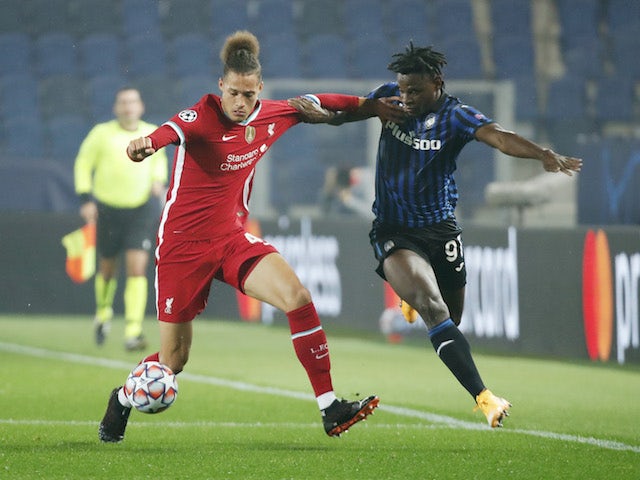 Atalanta BC's Duvan Zapata in action with Liverpool's Rhys Williams in the Champions League on November 3, 2020