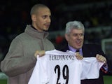 Rio Ferdinand pictured with then-Leeds chairman Peter Risdale in November 2000