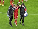 Bayern Munich's Joshua Kimmich is helped off after picking up an injury in November 2020