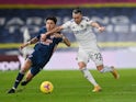 Arsenal's Hector Bellerin in action with Leeds United's Jack Harrison in the Premier League on November 22, 2020
