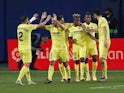Villarreal's Gerard Moreno celebrates scoring their first goal with teammates against Real Madrid on November 21, 2020