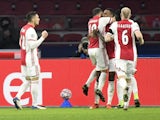 Ajax players celebrate scoring against FC Midtjylland on November 25, 2020