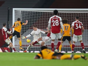 Jimenez suffers serious head injury as Wolves win at Arsenal