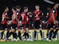 Junior Stanislas celebrates with teammates after scoring for Bournemouth against Nottingham Forest in the Championship on November 24, 2020